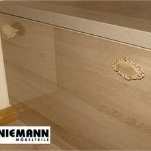 Niemann Пример применения панелей Niemann Глянцевый фасад  H 1267 Ясень молина.