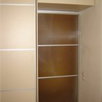 Sliding door wardrobe and room divider