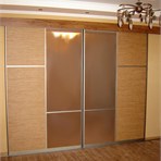  Sliding door wardrobes Room divider is created from materials of warm sandy colors